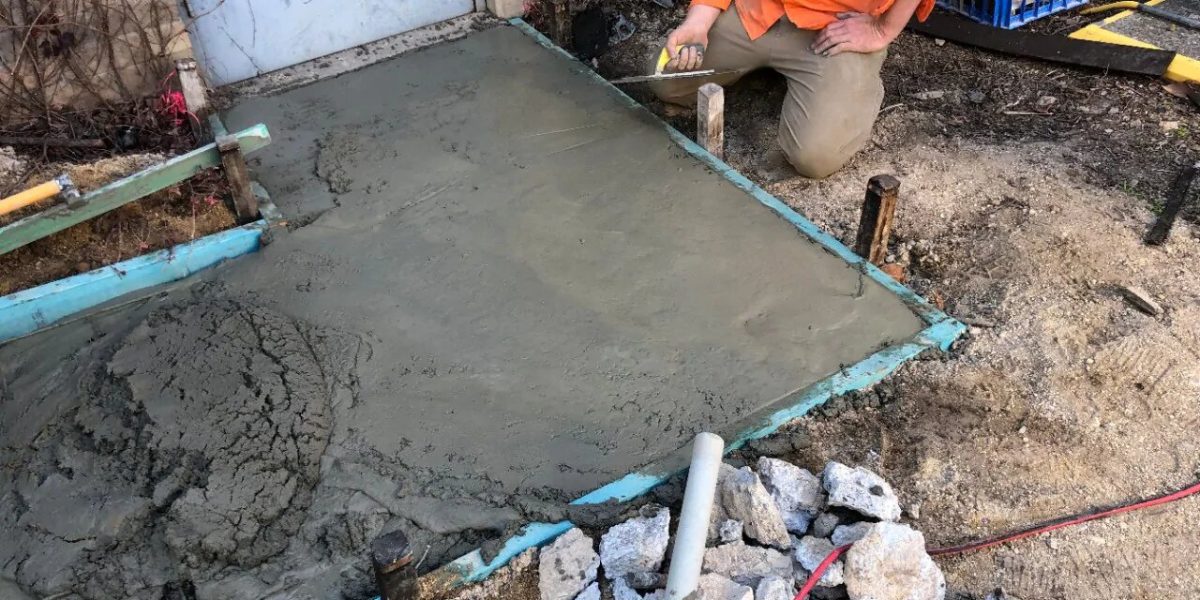 pouring new layer of concrete over concrete